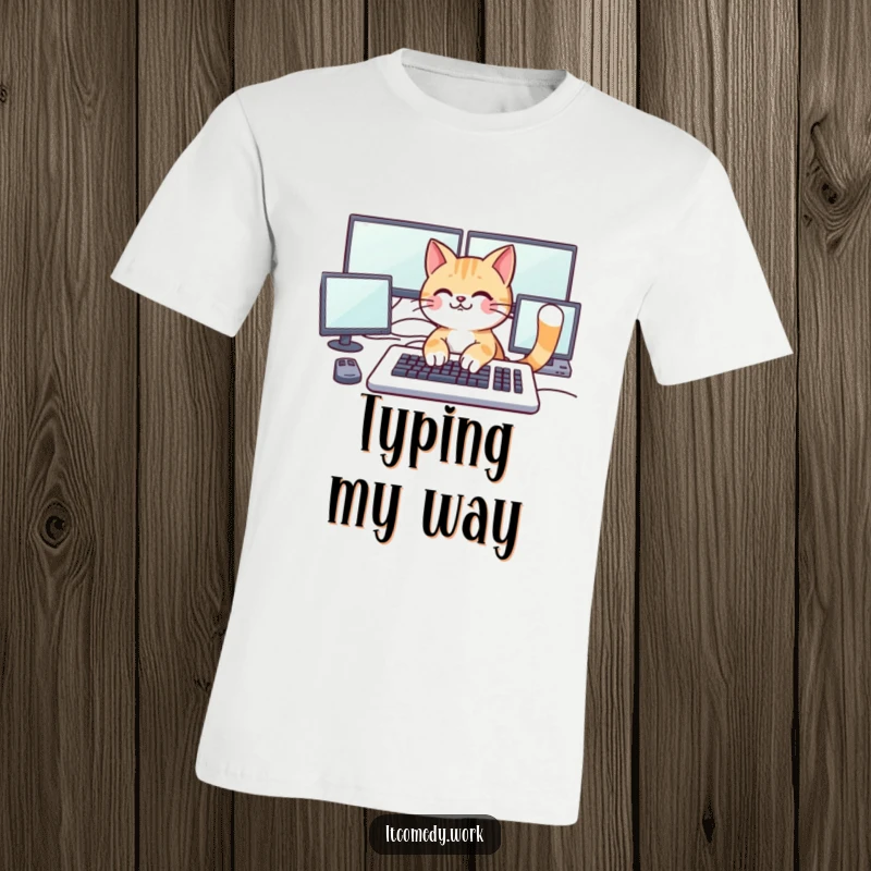 Funny playful cat character typing on a large keyboard with multiple monitors, perfect for a humorous tech t-shirt.